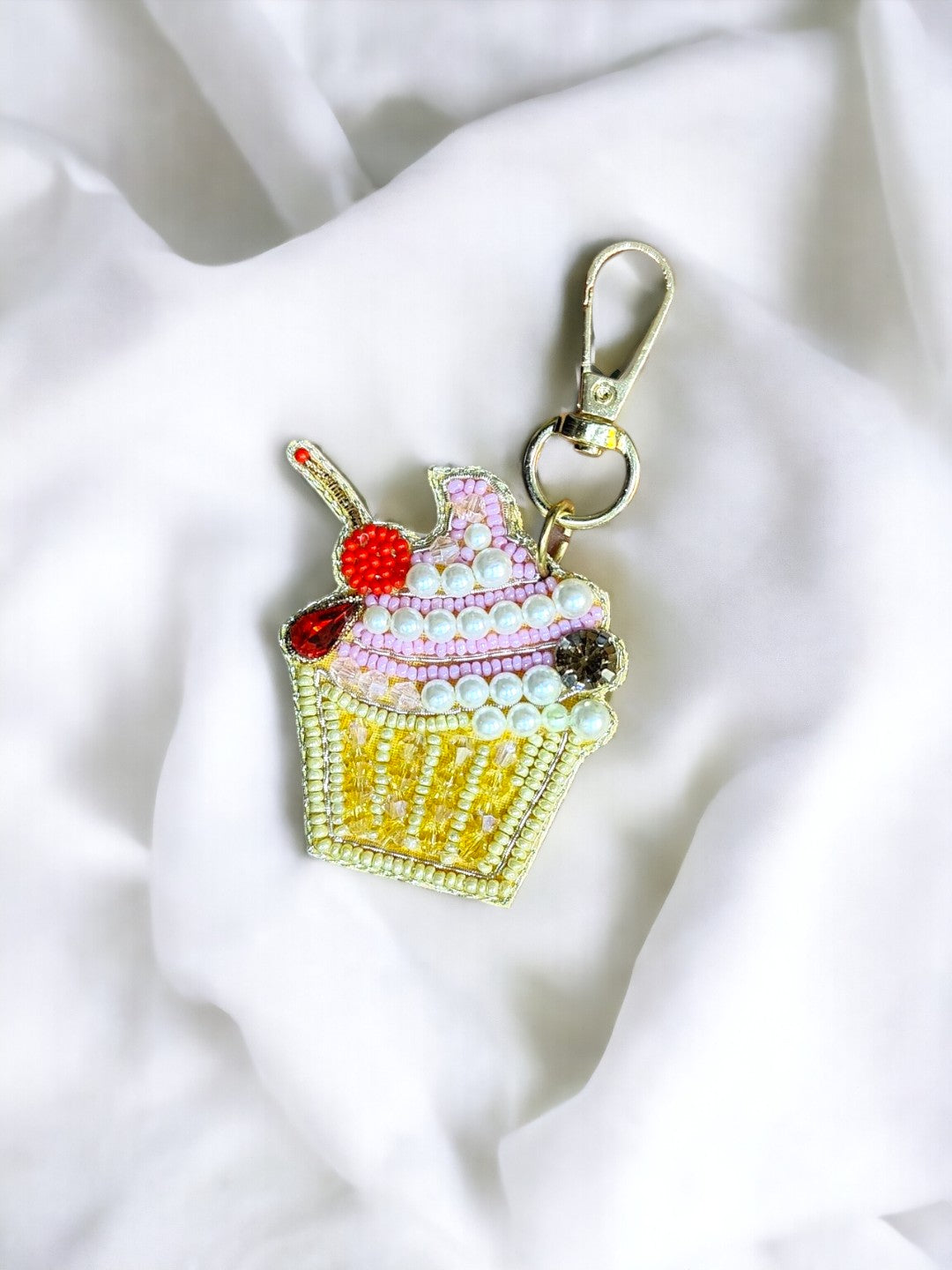 Whether you're a cupcake enthusiast or simply love cute accessories, this charm is sure to spark joy and admiration wherever you go.