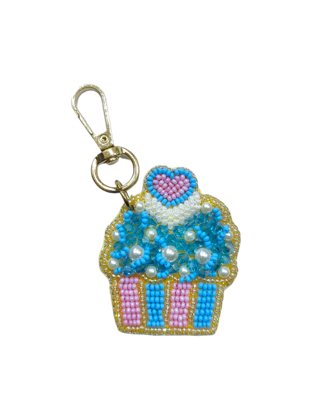 Attach the cupcake charm to your bag or keychain for instant charm.
